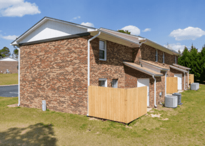 The backside of one of the brick townhome buildings at Cedar Heights